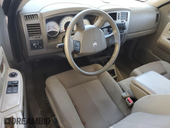 2006 Dodge Dakota SLT z VIN 1D7HE42N36S523634, wystawiony jako Copart lot #62717474 z przebiegiem 72 295 mil mil oraz Szkoda całkowita • Salvage title. Historia ofert i sprzedaży dostępna na DreamBid. Obrazek 8.