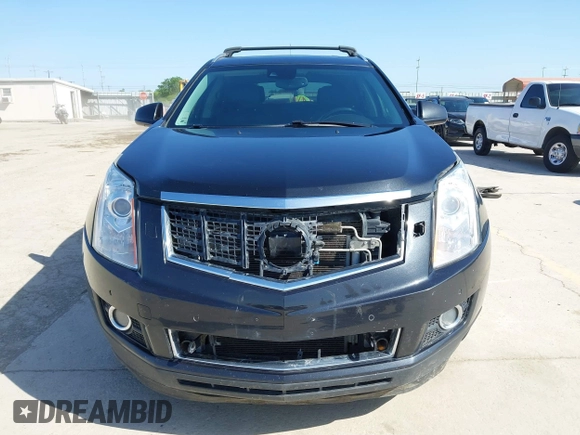 2013 Cadillac SRX Performance Collection with VIN 3GYFNHE35DS548632, listed as a IAAI auction lot 41990670 with 98,659 mi miles. Bid and sale history available at carsss.com. Image 12.