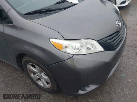 2015 Toyota Sienna L with VIN 5TDZK3DC9FS563593, listed as a IAAI auction lot 41466419 with 136,394 mi miles and . Bid and sale history available at DreamBid. Image 6.