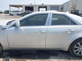 2009 Cadillac CTS RWD z VIN 1G6DV57V990149721, wystawiony jako IAAI lot #42293590 z przebiegiem 64 642 mil mil oraz . Historia ofert i sprzedaży dostępna na DreamBid. Obrazek 13.