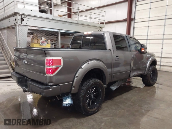 2014 Ford F-150 XL with VIN 1FTFW1ET8EFC55842, listed as a IAAI auction lot 42108858 with 190,601 mi miles. Bid and sale history available at carsss.com. Image 4.