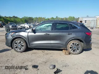 2020 Ford Escape Titanium Hybrid with VIN 1FMCU9DZ2LUA86600, listed as a IAAI auction lot 42059830 with 76,998 mi miles and . Bid and sale history available at DreamBid. Image 13.