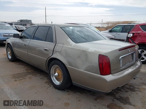 2003 Cadillac DeVille z VIN 1G6KD54Y63U223640, wystawiony jako IAAI lot #41704549 z przebiegiem 127 981 mil mil oraz . Historia ofert i sprzedaży dostępna na DreamBid. Obrazek 3.