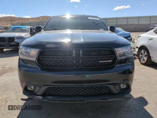 2015 Dodge Durango SXT with VIN 1C4RDHAG6FC850065, listed as a Copart auction lot 57144295 with 243,646 mi miles and Salvage title. Bid and sale history available at DreamBid. Image 5.