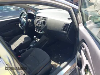 2013 Kia Rio LX with VIN KNADM5A33D6307061, listed as a IAAI auction lot 42143985 with 66,621 mi miles and . Bid and sale history available at DreamBid. Image 5.