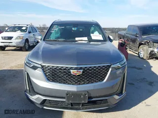 2020 Cadillac XT6 FWD Premium Luxury with VIN 1GYKPCRS8LZ129799, listed as a IAAI auction lot 41602536 with 96,865 mi miles. Bid and sale history available at carsss.com. Image 12.