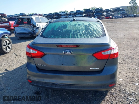 2013 Ford Focus S with VIN 1FADP3E24DL317766, listed as a IAAI auction lot 42029670 with 159,130 mi miles. Bid and sale history available at carsss.com. Image 16.