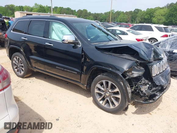 2017 Jeep Grand Cherokee Overland z VIN 1C4RJFCG4HC662884, wystawiony jako IAAI lot #42172826 z przebiegiem 79 305 mil mil oraz . Historia ofert i sprzedaży dostępna na DreamBid. Obrazek 1.