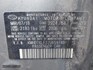 2018 Hyundai Elantra SE with VIN KMHD74LF3JU659748, listed as a IAAI auction lot 41971050 with 124,851 mi miles. Bid and sale history available at carsss.com. Image 9.