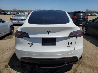 2023 Tesla Model Y Long Range z VIN 7SAYGDEE3PF772663, wystawiony jako Copart lot #56470455 z przebiegiem 50 705 mil mil oraz Czysty tytuł • Clean title. Historia ofert i sprzedaży dostępna na DreamBid. Obrazek 6.