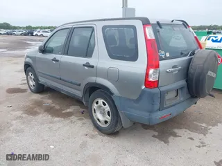 2006 Honda CR-V LX with VIN JHLRD68566C002862, listed as a IAAI auction lot 41954749 with 294,867 mi miles. Bid and sale history available at carsss.com. Image 3.
