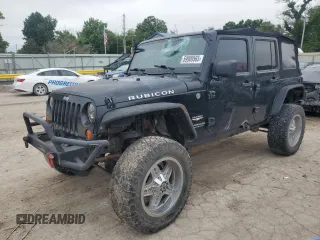 2007 Jeep Wrangler Unlimited Rubicon with VIN 1J4GA69117L112867, listed as a Copart auction lot 59909565 with 166,963 mi miles and Salvage title. Bid and sale history available at DreamBid. Image 1.