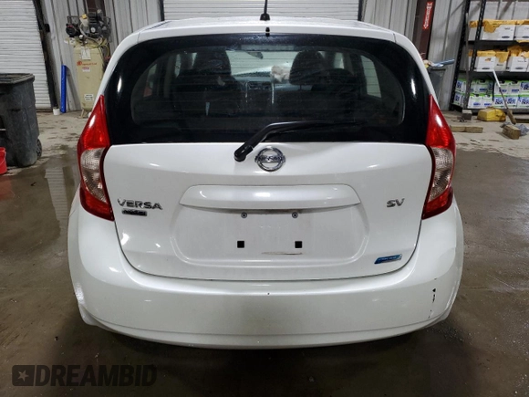 2014 Nissan Note S z VIN 3N1CE2CP2EL396903, wystawiony jako Copart lot #55398645 z przebiegiem 72 067 mil mil oraz Szkoda całkowita • Salvage title. Historia ofert i sprzedaży dostępna na DreamBid. Obrazek 6.