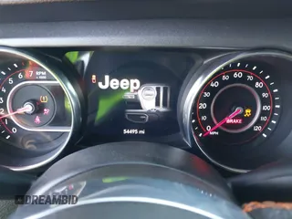 2022 Jeep Gladiator Mojave with VIN 1C6JJTEGXNL155838, listed as a IAAI auction lot 41968917 with 54,495 mi miles and . Bid and sale history available at DreamBid. Image 7.
