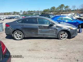 2018 Ford Fusion SE z VIN 3FA6P0H74JR233829, wystawiony jako IAAI lot #42049766 z przebiegiem 120 370 mil mil oraz . Historia ofert i sprzedaży dostępna na DreamBid. Obrazek 13.