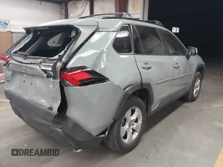 2019 Toyota RAV4 XLE with VIN JTMP1RFV2KD028137, listed as a IAAI auction lot 41931454 with 88,998 mi miles and . Bid and sale history available at DreamBid. Image 4.