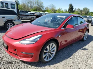 2018 Tesla Model 3 Long Range Battery z VIN 5YJ3E1EB2JF065692, wystawiony jako Copart lot #56060875 z przebiegiem 68 946 mil mil oraz Szkoda całkowita • Salvage title. Historia ofert i sprzedaży dostępna na DreamBid. Obrazek 1.