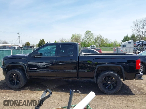 2017 GMC Sierra 1500 SLE z VIN 1GTV2MEC2HZ105964, wystawiony jako IAAI lot #42091941 z przebiegiem 93 779 mil mil oraz . Historia ofert i sprzedaży dostępna na DreamBid. Obrazek 14.