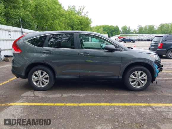 2013 Honda CR-V EX z VIN 2HKRM4H58DH656443, wystawiony jako IAAI lot #42348940 z przebiegiem 79 477 mil mil oraz . Historia ofert i sprzedaży dostępna na DreamBid. Obrazek 14.