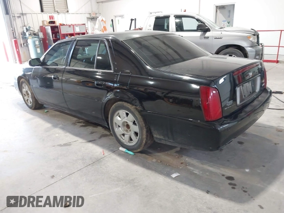 2002 Cadillac DeVille DTS with VIN 1G6KF579X2U141648, listed as a IAAI auction lot 42059624 with 179,338 mi miles. Bid and sale history available at carsss.com. Image 3.