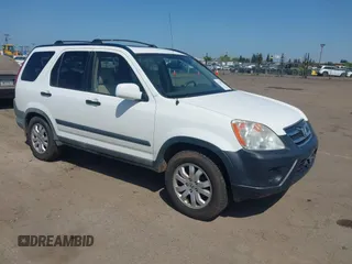 2005 Honda CR-V EX with VIN JHLRD78865C063319, listed as a IAAI auction lot 42160375 with 203,213 mi miles. Bid and sale history available at carsss.com. Image 1.