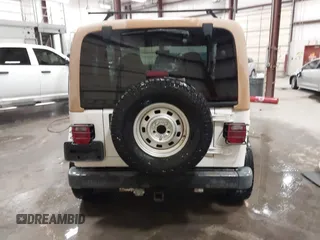 1997 Jeep Wrangler Sahara with VIN 1J4FY49S3VP529837, listed as a IAAI auction lot 41752978 with 138,024 mi miles. Bid and sale history available at carsss.com. Image 16.