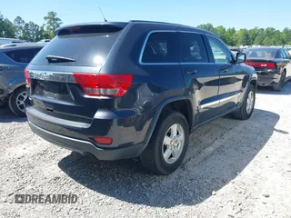 2012 Jeep Grand Cherokee Laredo with VIN 1C4RJEAG9CC223167, listed as a IAAI auction lot 42136098 with 152,715 mi miles. Bid and sale history available at carsss.com. Image 4.