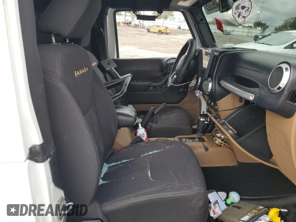 2013 Jeep Wrangler Sahara z VIN 1C4AJWBG7DL512437, wystawiony jako Copart lot #48928325 z przebiegiem Nie podano mil oraz Szkoda całkowita • Salvage title. Historia ofert i sprzedaży dostępna na DreamBid. Obrazek 7.