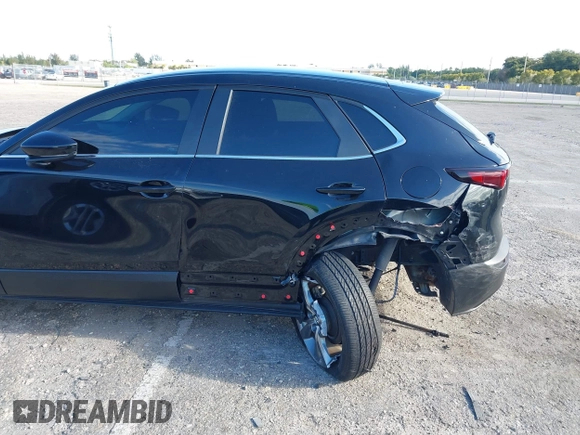 2023 Mazda CX-30 S Select with VIN 3MVDMBBM9PM508958, listed as a IAAI auction lot 42009029 with 21,219 mi miles and . Bid and sale history available at DreamBid. Image 6.