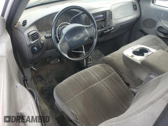1998 Ford F-150 with VIN 1FTZF18W6WKC03783, listed as a Copart auction lot 86201354 with 160,000 mi miles and Salvage title. Bid and sale history available at DreamBid. Image 8.