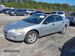 2003 Dodge Stratus SE z VIN 1B3EL36T63N536413, wystawiony jako IAAI lot #41631999 z przebiegiem Nie podano mil oraz . Historia ofert i sprzedaży dostępna na DreamBid. Obrazek 2.
