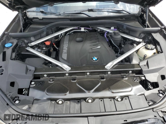 2024 BMW X5 sDrive40i z VIN 5UX13EU01R9V06527, wystawiony jako Copart lot #54611085 z przebiegiem 13 886 mil mil oraz Szkoda całkowita • Salvage title. Historia ofert i sprzedaży dostępna na DreamBid. Obrazek 12.
