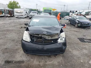 2005 Toyota Prius z VIN JTDKB20U253039812, wystawiony jako IAAI lot #42317371 z przebiegiem 281 142 mil mil oraz . Historia ofert i sprzedaży dostępna na DreamBid. Obrazek 13.