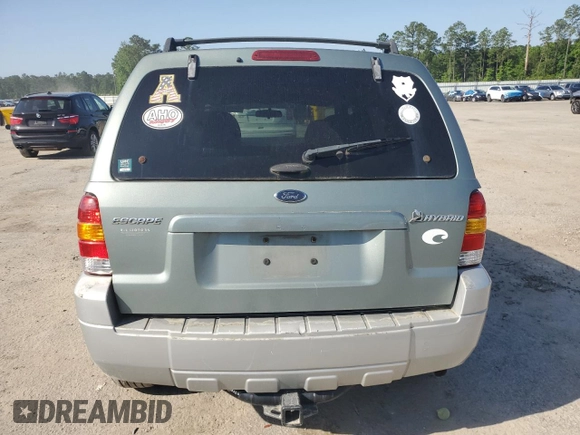 2005 Ford Escape Hybrid z VIN 1FMCU95HX5KB95634, wystawiony jako Copart lot #56513595 z przebiegiem 228 188 mil mil oraz Czysty tytuł • Clean title. Historia ofert i sprzedaży dostępna na DreamBid. Obrazek 6.