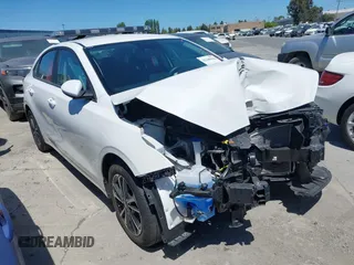 2024 Kia Forte LXS z VIN 3KPF24AD2RE798485, wystawiony jako IAAI lot #42349436 z przebiegiem 7 809 mil mil oraz . Historia ofert i sprzedaży dostępna na DreamBid. Obrazek 1.