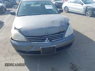 2006 Mitsubishi Lancer ES with VIN JA3AJ26E36U013907, listed as a IAAI auction lot 41722047 with 248,768 mi miles. Bid and sale history available at carsss.com. Image 6.