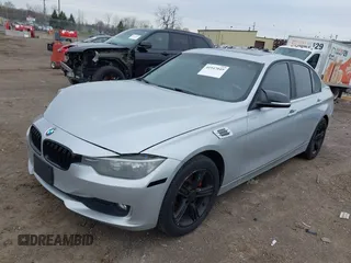 2014 BMW 3 Series 320i xDrive with VIN WBA3C3C58EP661364, listed as a IAAI auction lot 41947049 with 211,982 mi miles and . Bid and sale history available at DreamBid. Image 2.