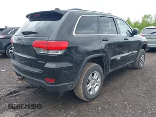 2016 Jeep Grand Cherokee Laredo with VIN 1C4RJFAG2GC436005, listed as a IAAI auction lot 42377859 with 129,724 mi miles and . Bid and sale history available at DreamBid. Image 4.