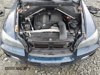 2013 BMW X6 xDrive35i z VIN 5UXFG2C55DL788611, wystawiony jako Copart lot #50972395 z przebiegiem 131 755 mil mil oraz Szkoda całkowita • Salvage title. Historia ofert i sprzedaży dostępna na DreamBid. Obrazek 12.
