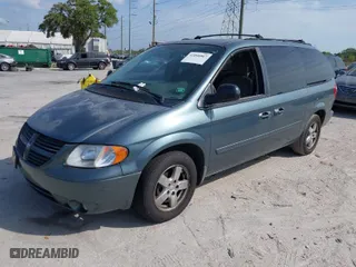 2005 Dodge Caravan SXT with VIN 2D8GP44L55R130702, listed as a IAAI auction lot 42090867 with 232,655 mi miles. Bid and sale history available at carsss.com. Image 2.