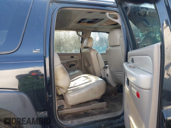 2002 Chevrolet Suburban Z71 with VIN 3GNFK16Z42G199561, listed as a IAAI auction lot 41442707 with 229,823 mi miles. Bid and sale history available at carsss.com. Image 8.