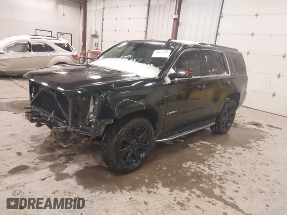 2016 GMC Yukon SLE with VIN 1GKS2AKC1GR276262, listed as a IAAI auction lot 41336378 with 213,182 mi miles. Bid and sale history available at carsss.com. Image 17.