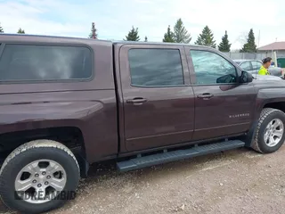 2016 Chevrolet Silverado 1500 LT with VIN 3GCUKREC3GG305792, listed as a IAAI auction lot 42083847 with 72,325 mi miles and . Bid and sale history available at DreamBid. Image 14.
