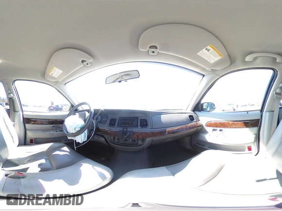 2005 Mercury Grand Marquis GS with VIN 2MEFM74W55X654070, listed as a Copart auction lot 53114785 with 56,128 mi miles and Salvage Title. Bid and sale history available at DreamBid. Image 13.