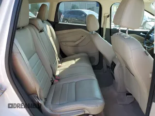 2015 Ford Escape Titanium with VIN 1FMCU0J93FUA58325, listed as a Copart auction lot 64135685 with 126,356 mi miles and Salvage title. Bid and sale history available at DreamBid. Image 11.