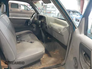 1994 Ford Ranger Splash with VIN 1FTCR10A3RUD35437, listed as a IAAI auction lot 42658300 with 220,218 mi miles and . Bid and sale history available at DreamBid. Image 5.