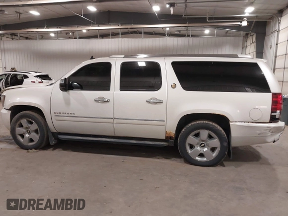 2010 Chevrolet Suburban LTZ with VIN 1GNUKKE31AR290571, listed as a IAAI auction lot 40948006 with 163,758 mi miles. Bid and sale history available at carsss.com. Image 13.