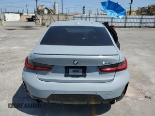 2023 BMW 3 Series 330i with VIN 3MW69FF00P8D52700, listed as a Copart auction lot 61629485 with 12,007 mi miles and Salvage title. Bid and sale history available at DreamBid. Image 6.
