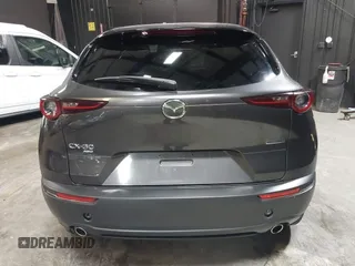 2021 Mazda CX-30 Preferred with VIN 3MVDMBCL1MM247701, listed as a IAAI auction lot 42299009 with 15,880 mi miles and . Bid and sale history available at DreamBid. Image 17.