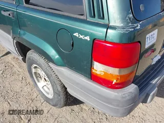 1998 Jeep Grand Cherokee Laredo with VIN 1J4GZ58S5WC362365, listed as a IAAI auction lot 41891397 with 246,673 mi miles. Bid and sale history available at carsss.com. Image 6.